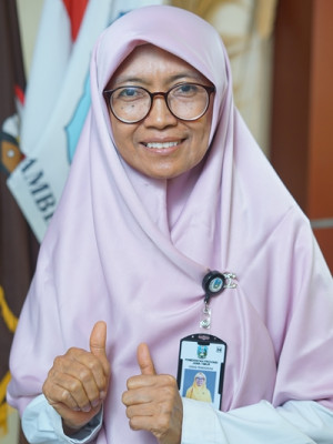 Dra. TITIN SURYANI